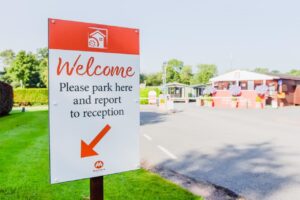 Welcome sign at Poston Mill Touring Park